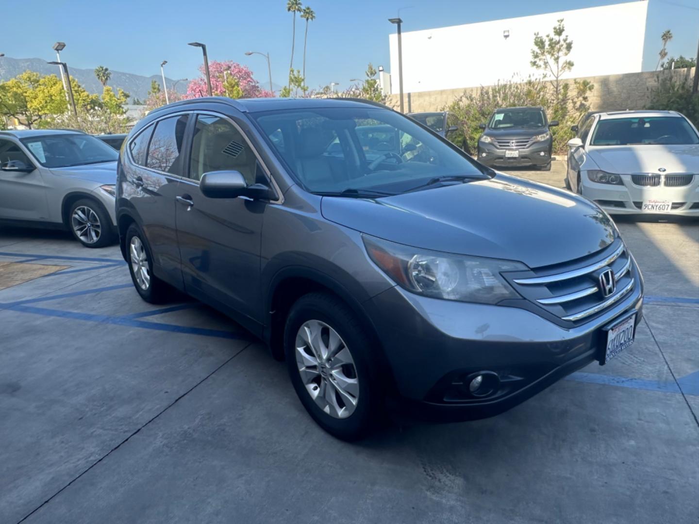 2012 Grey /Gray Honda CR-V EX-L 2WD 5-Speed AT (JHLRM3H78CC) with an 2.4L L4 DOHC 16V engine, 5-Speed Automatic transmission, located at 30 S. Berkeley Avenue, Pasadena, CA, 91107, (626) 248-7567, 34.145447, -118.109398 - Moon-roof! Leather seats! This 2012 Honda CR-V EX-L 2WD 5-Speed AT looks and drives good. - Photo#6